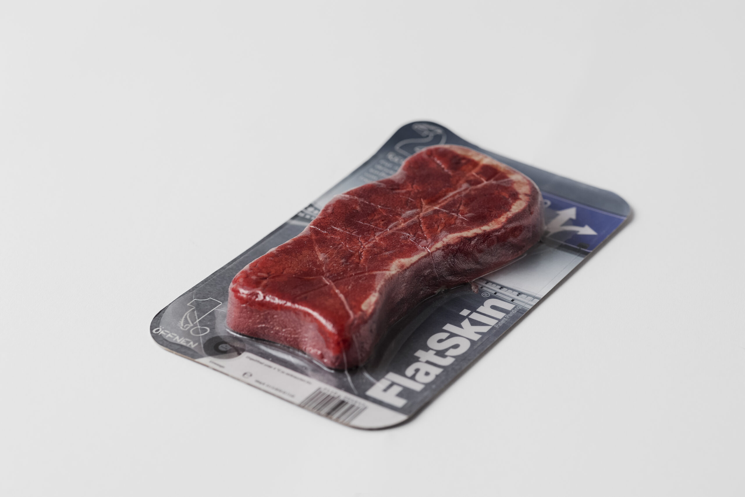 Folienkaschierung Flatskin Fleischverpackung, Produkt Lebensmittelverpackung von Achilles