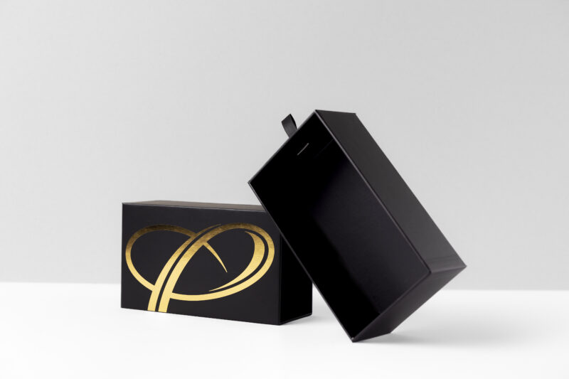 Schachtel im Schuber mit einer Goldprägung für das Unternehmen Gentlejam, vom Druckveredeler Achilles